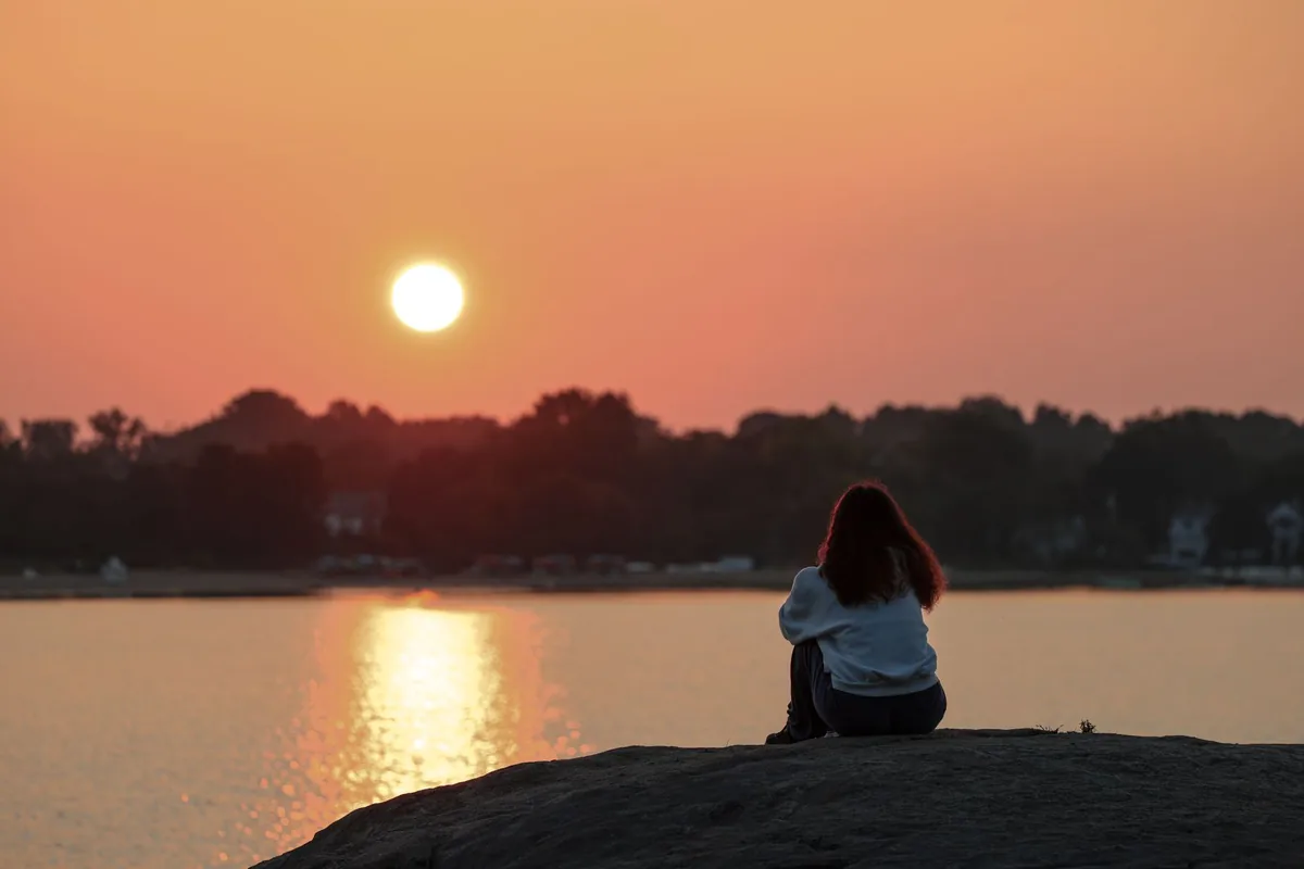 Sunrise meditation by the Ganga, Rishikesh